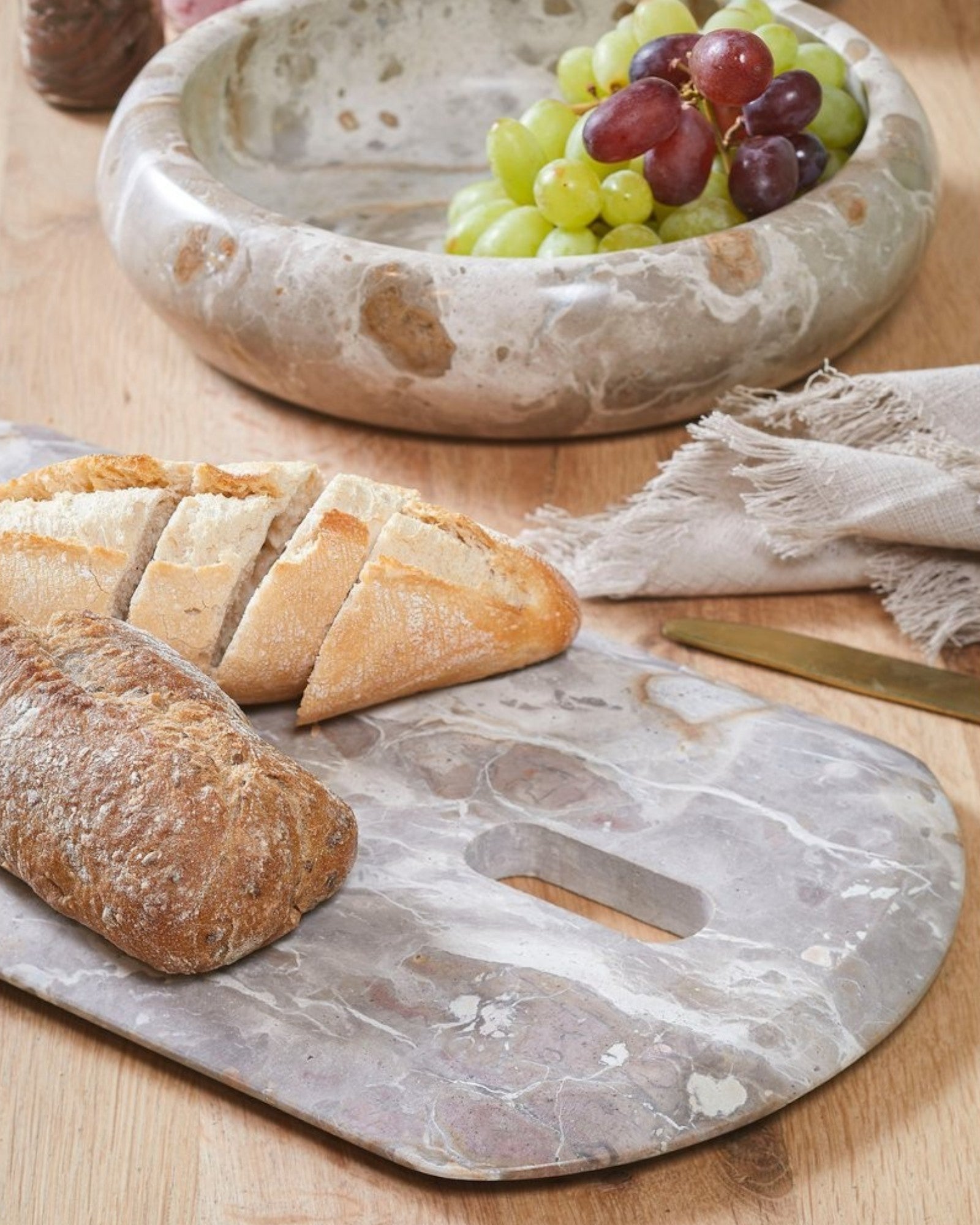 Dounge | Planche à découper en marbre beige – élégante et durable